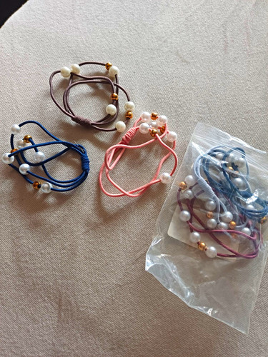 Armbänder oder als haargummi - als,